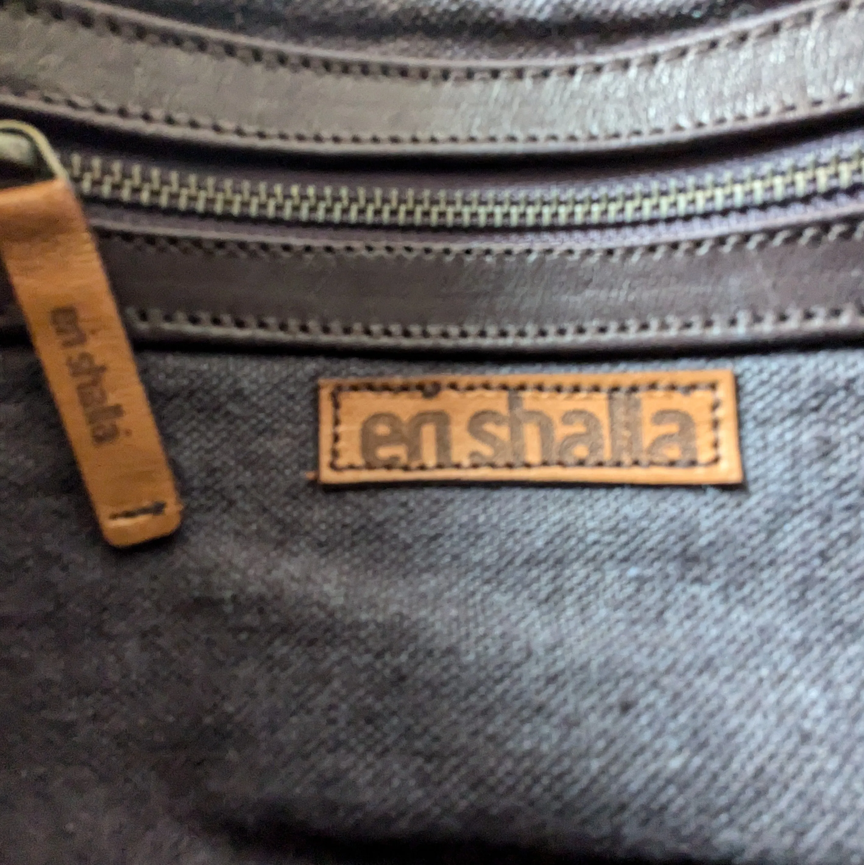 Enshalla Woven Leather Clutch