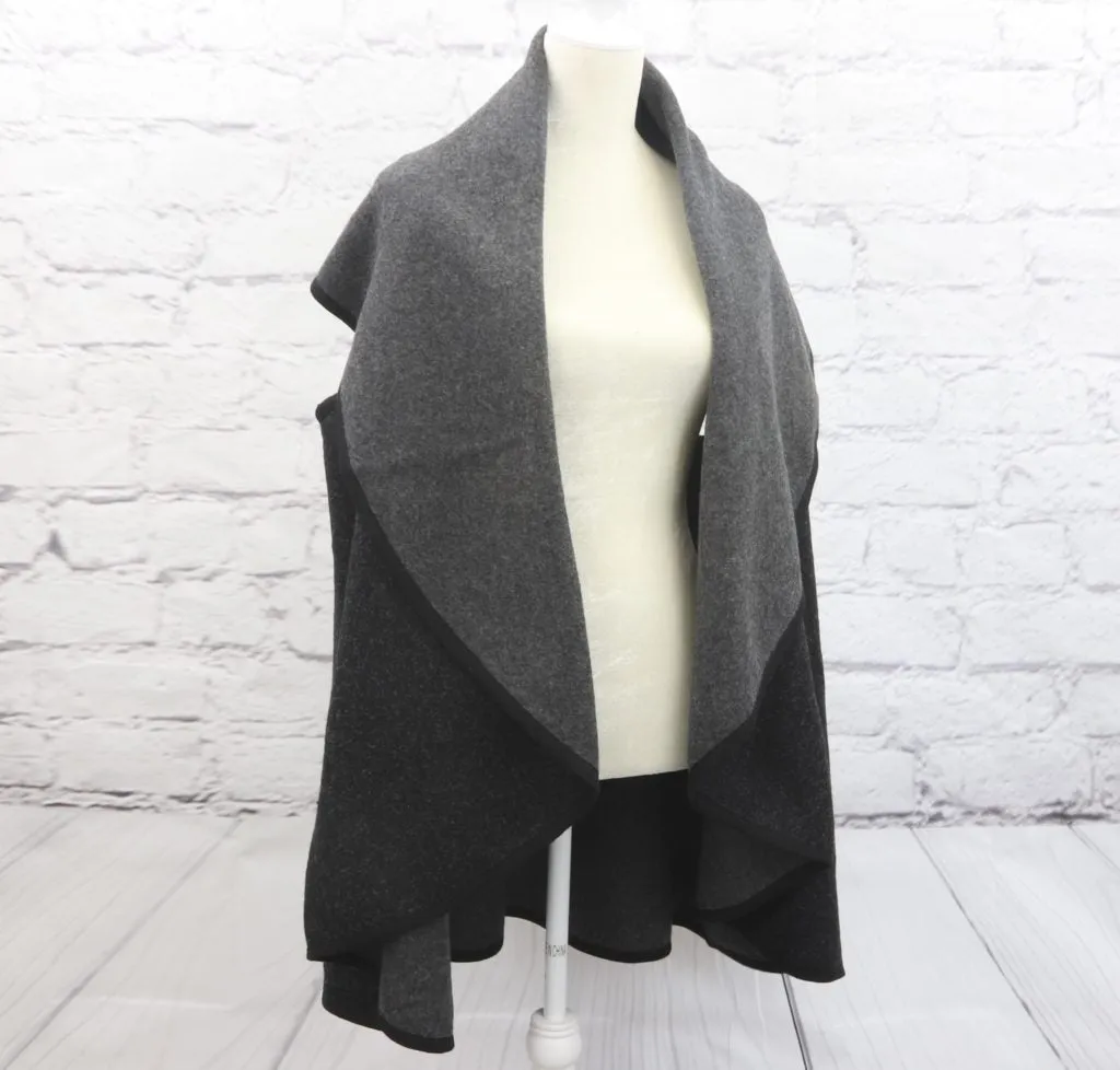 Reversible, multi-function shawl/vest