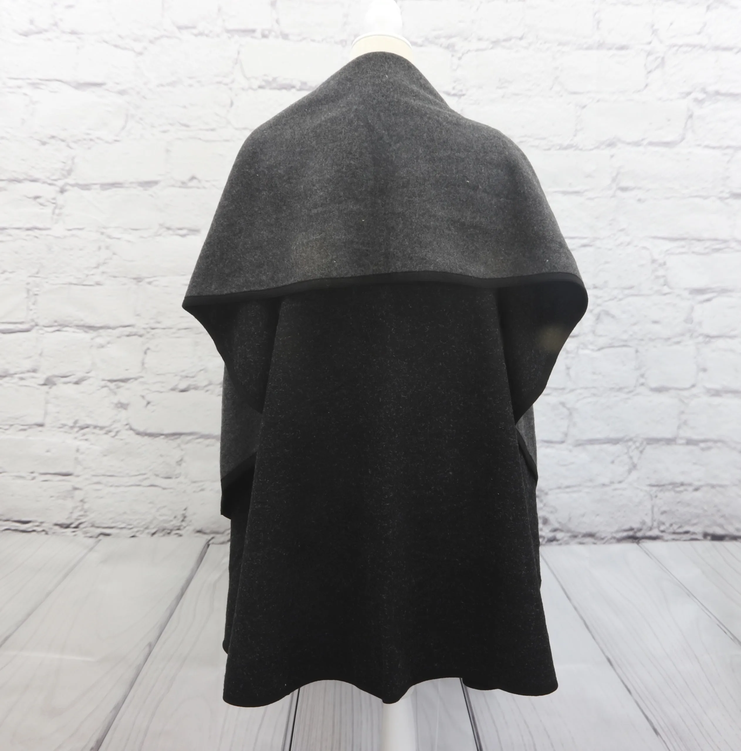 Reversible, multi-function shawl/vest