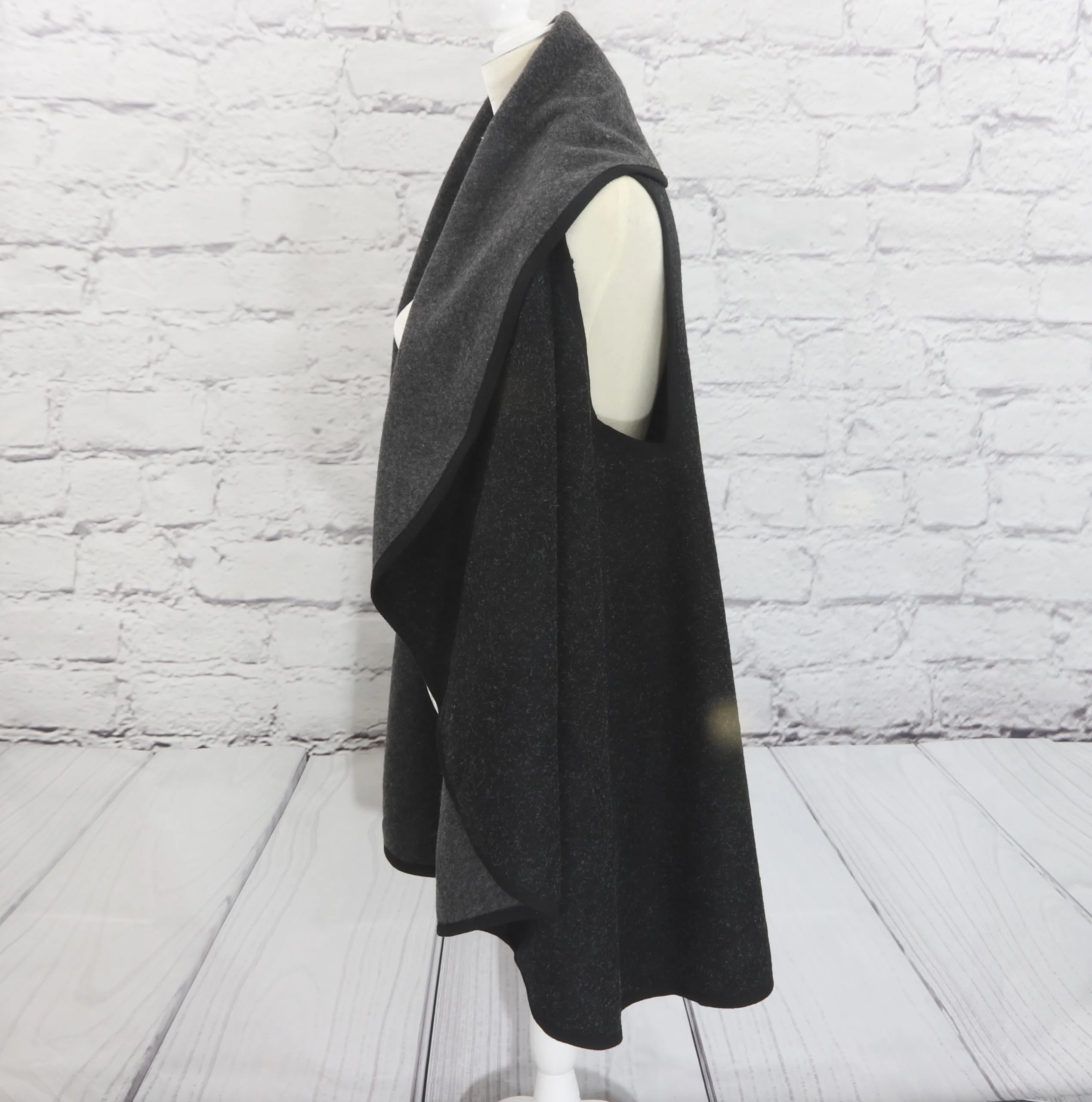 Reversible, multi-function shawl/vest